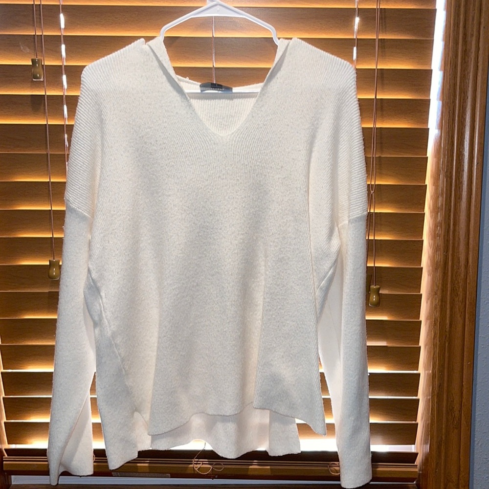 White hooded sweater